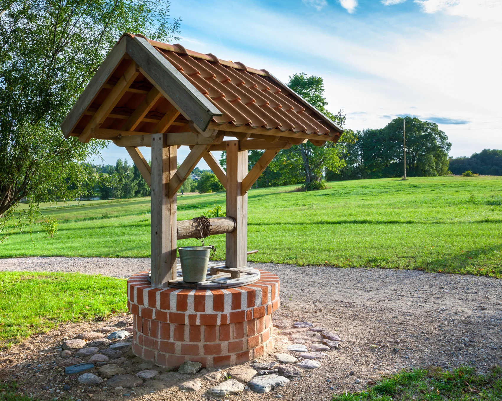 Well in a grassy field — well water treatment services