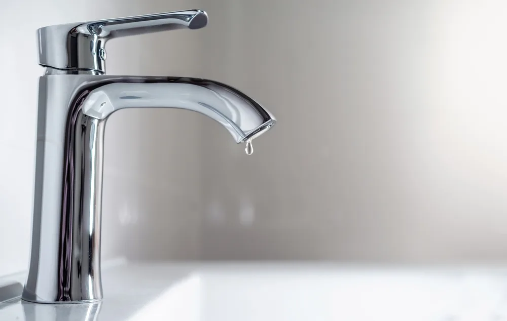 Vintage bathroom faucet being repaired and restored by Saffer Total Home